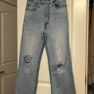 Levi's High Rise Light Blue Distressed Jeans